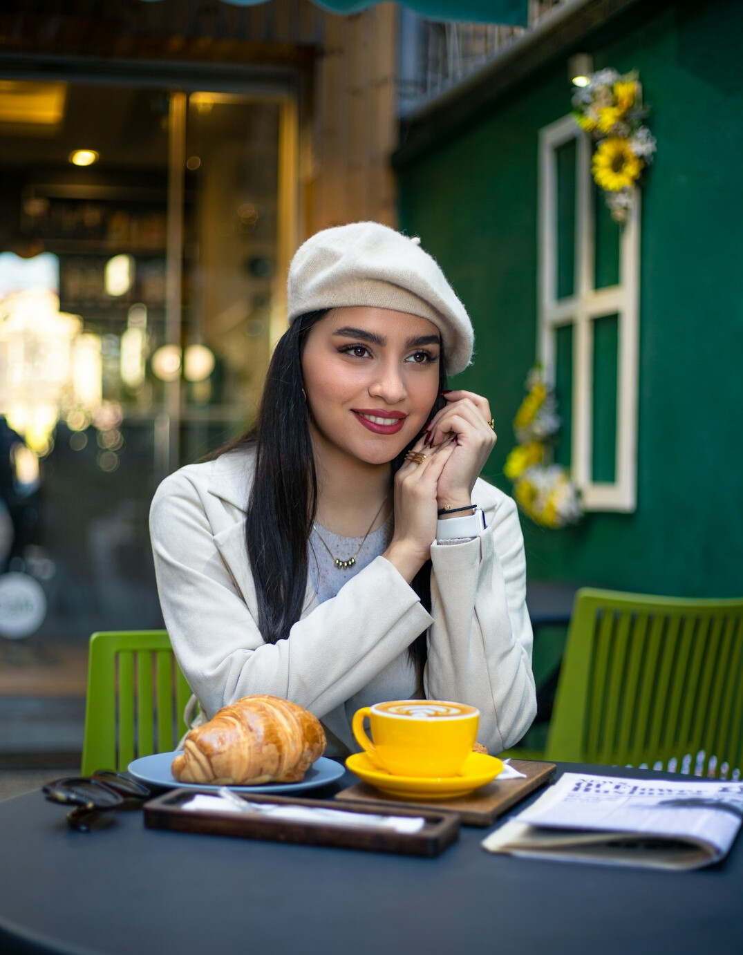 female novelist at cafe