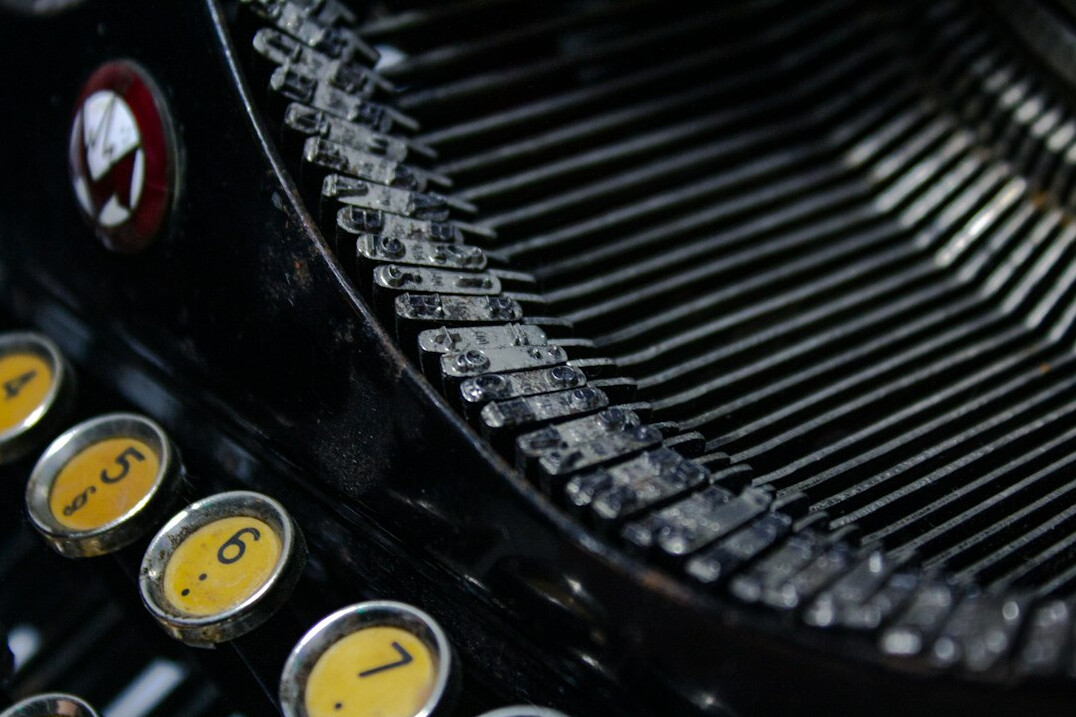 Vintage typewriter on a wooden desk