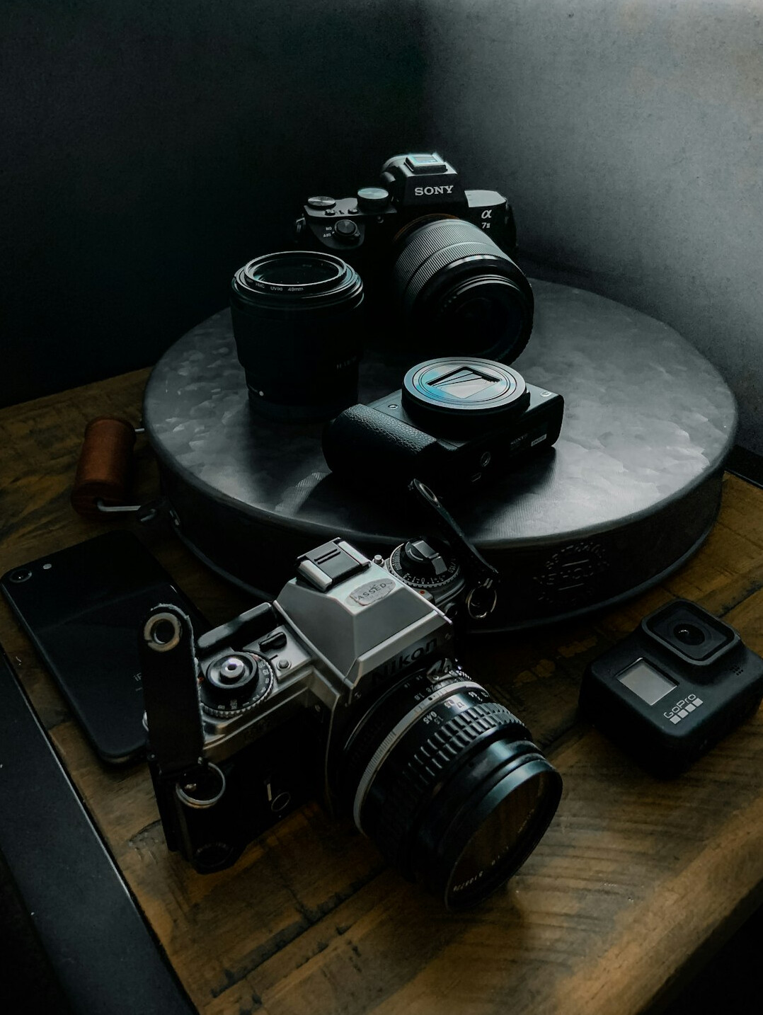 Professional camera equipment resting on a studio table