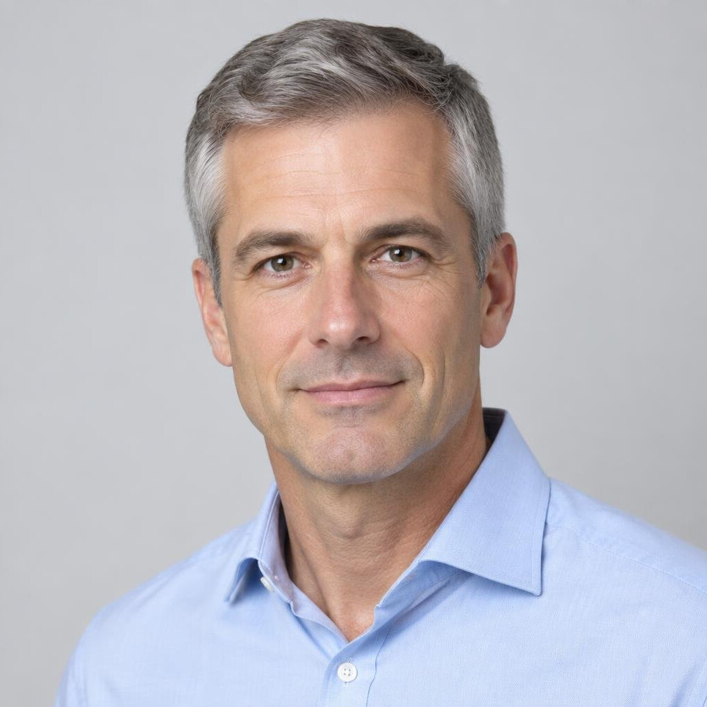 Studio portrait of a European man with short hair