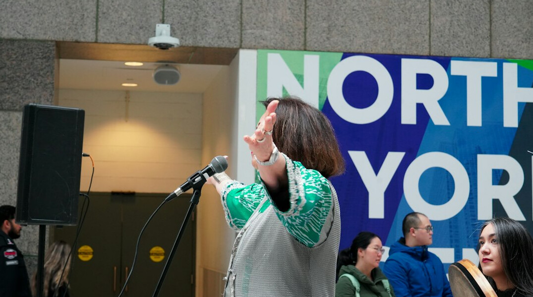philanthropist speaking at community event